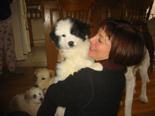 Sally holding puppy Amos