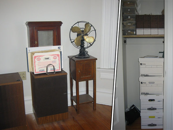 Tidy office with boxes in closet