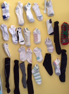 Pin orphan socks to the laundry room wall to easily find mates